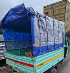 Truck and vehicle tarpaulin 1